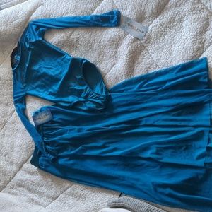 Double platinum performance wear large child new with tags bodysuit and skirt